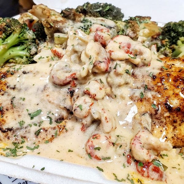 Honey Jerk Shrimp & Salmon Over Hibachi Rice.